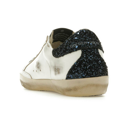 Golden Goose Super Star with sliver glitter star and black heel tab sneakers