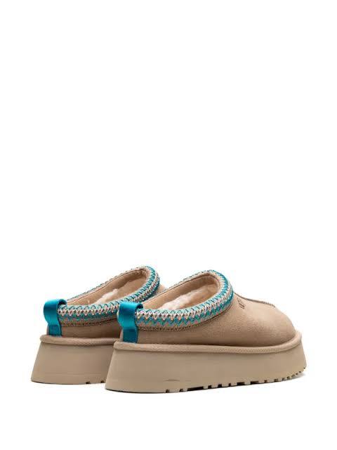 UGG Tazz II slipper in a tan brown suede finish with a contrast blue braided