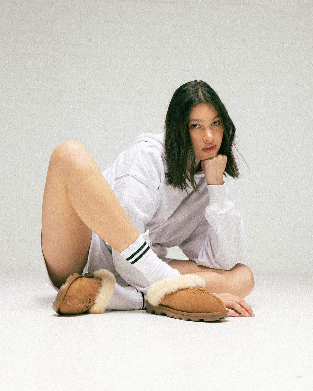 UGG Coquette Slipper chestnut featuring a sheepskin collar and a durable rubber