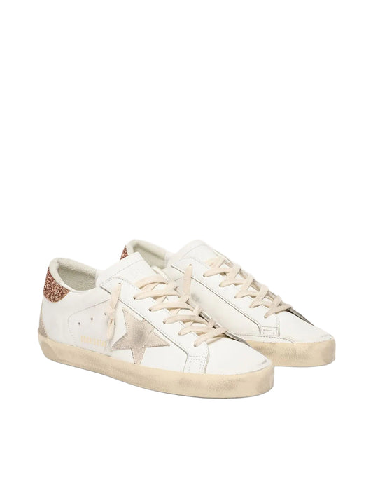 Golden Goose Super-Star with a suede star and peach-pink glitter heel tab