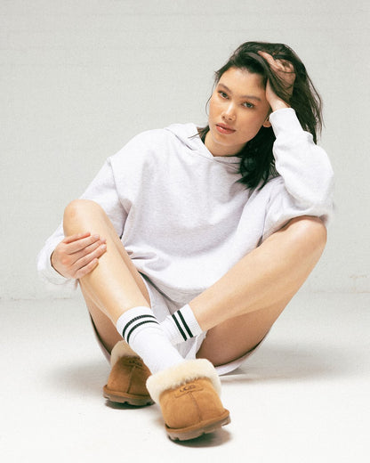 UGG Coquette Slipper chestnut featuring a sheepskin collar and a durable rubber