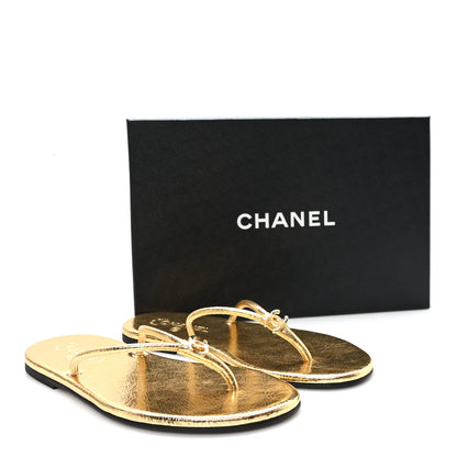 Chanel Interlocking CC Logo Flip Flops in gold leather