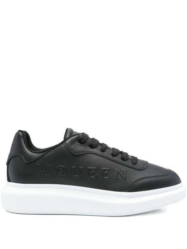 Alexander McQueen Oversized black embossed-logo platform sneakers_Unique Store