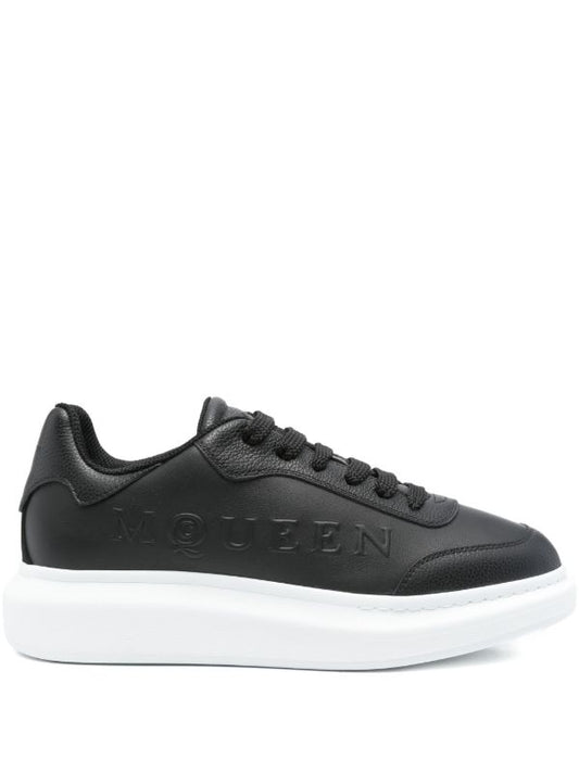 Alexander McQueen Oversized black embossed-logo platform sneakers_Unique Store