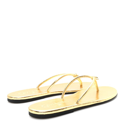 Chanel Interlocking CC Logo Flip Flops in gold leather