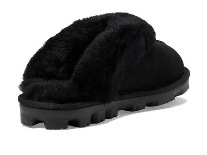 UGG Coquette Slipper black featuring a sheepskin collar and a durable rubber