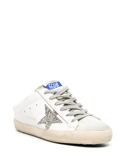 Golden Goose Super-Star Sabots in white leather with shearling lining and silver star